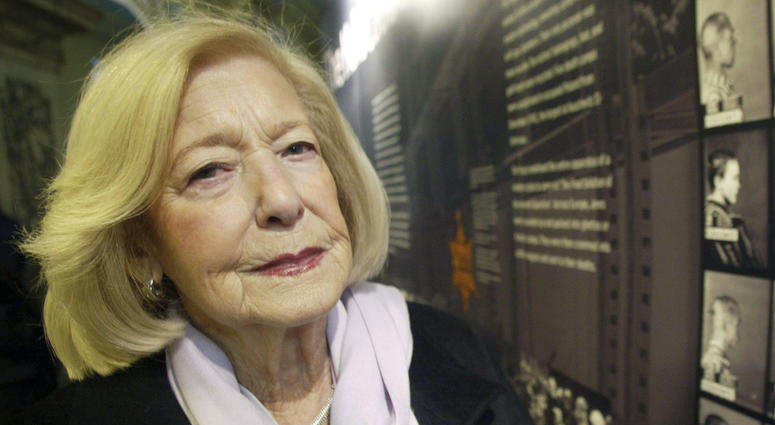 FILE - In this Jan. 27, 2004 file photo, Holcaust survivor Gena Turgel poses for a photo, in London. FILE - In this Jan. 27, 2004 file photo, Holcaust survivor Gena Turgel poses for a photo, in London.