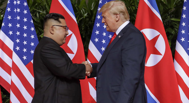 U.S. President Donald Trump shakes hands with North Korea leader Kim Jong Un at the Capella resort on Sentosa Island Tuesday, June 12, 2018 in Singapore. Donald Trump and Kim Jong Un