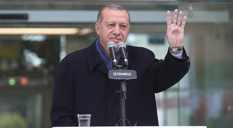 Turkish President Recep Tayyip Erdogan, waves following his speech at an opening ceremony for a new metro station in Istanbul, Sunday, Oct. 21, 2018. Turkish President Recep Tayyip Erdogan