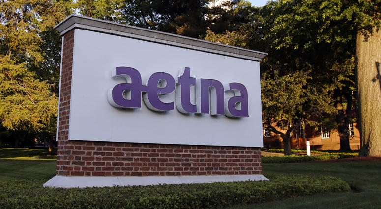 IN this June 1, 2017 file photo,. a sign stands on the campus of the Aetna headquarters in Hartford, Conn. Aetna