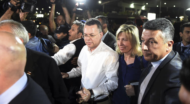 Pastor Andrew Brunson, center left, and his wife Norine Brunson arrive at Adnan Menderes airport for a flight to Germany after his release following his trial in Izmir, Turkey, Friday, Oct. 12, 2018. Andrew Brunson