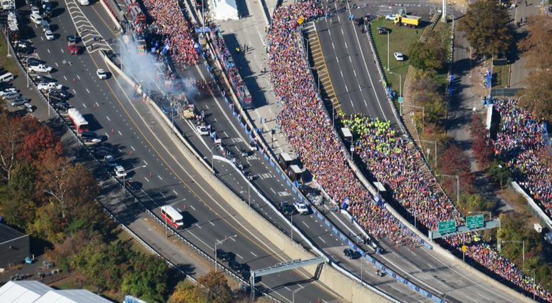 With the smoke from the Howitzer cannon hanging in the autumn air at the 2018 New York City Marathon 2018 New York City Marathon