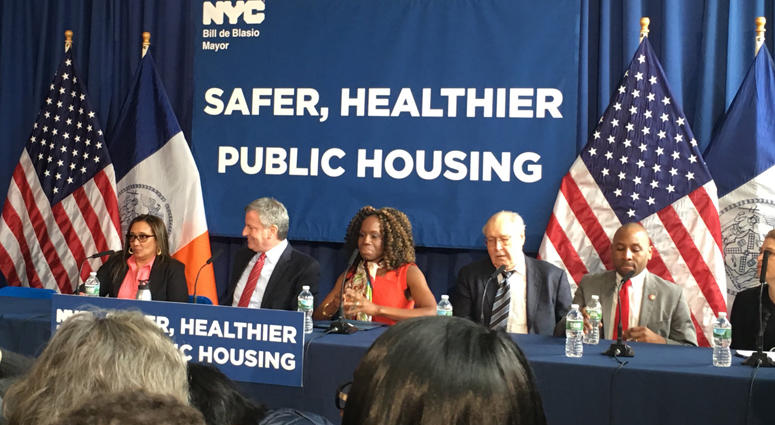 Embattled NYCHA chairwoman Shola Olatoye apepars one last time with Mayor Bill de Blasio. Shola Olatoye