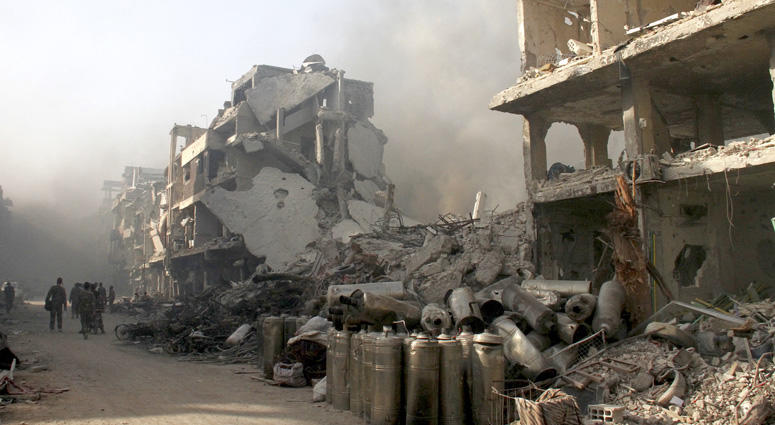 Photo taken on May 21, 2018 shows the ruins of buildings in the Hajar al-Aswad district, south of Damascus, Syria. Battle Near Damascus