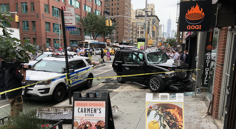 An SUV slammed into the Gogi Grill injuring four people. SUV Into Gogi Grill