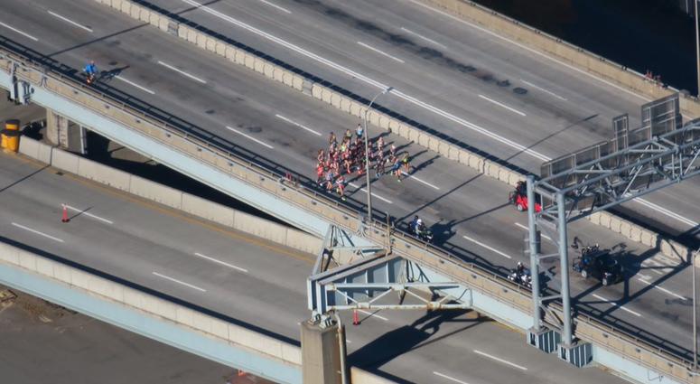 Elite female runners start across the Verrazzano Bridge, elite male runners and Wave 1 start toward the span 2018 New York City Marathon