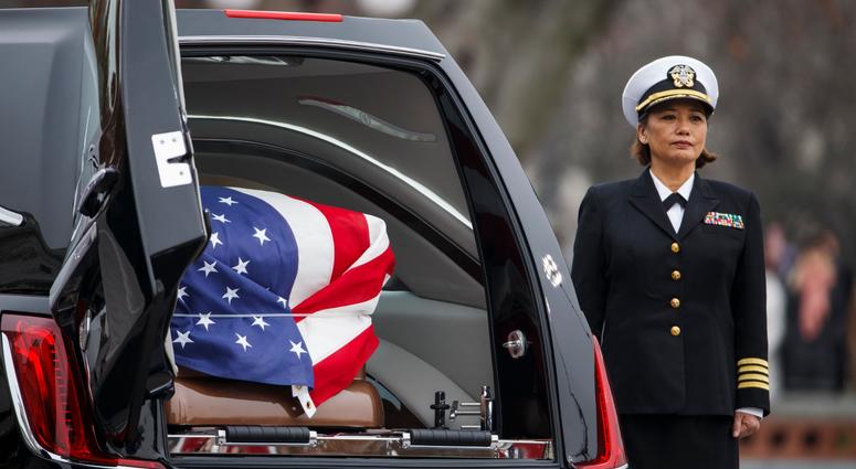 The casket of former US President George H.W. Bush sits in the hearse on the East Front of the US Capitol on December 5, 2018 in Washington, DC. George H.W. Bush