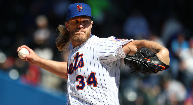 Noah Syndergaard #34 of the New York Mets pitches against the Washington Nationals during the Mets Home Opening game at Citi Field on April 04, 2019 in New York City. Noah Syndergaard