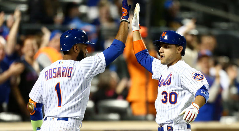 Michael Conforto #30 of the New York Mets celebrates with Amed Rosario #1 after hitting a home run in the sixth inning against the Miami Marlins at Citi Field on May 11, 2019 Michael Conforto and Ahmed Rosario