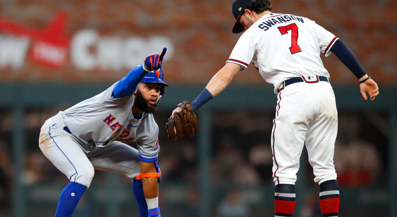 Amed Rosario #1 of the New York Mets reacts after coming up with a double in the fifth inning of an MLB game against the Atlanta Braves at SunTrust Park on June 17, 2019 Amed Rosario #1 of the New York Mets reacts after coming up with a double in the fifth inning of an MLB game against the Atlanta Braves at SunTrust Park on June 17, 2019