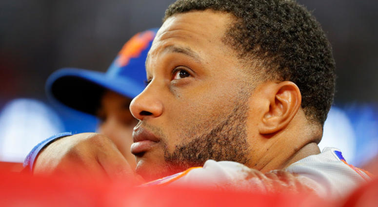 Robinson Cano #24 of the New York Mets looks on in the ninth inning against the Atlanta Braves at SunTrust Park on June 19, 2019 Robinson Cano #24 of the New York Mets looks on in the ninth inning against the Atlanta Braves at SunTrust Park on June 19, 2019