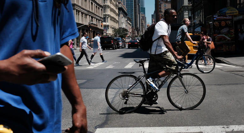 Bicyclists and pedestrians in New York City. Bicyclists and pedestrians in New York City