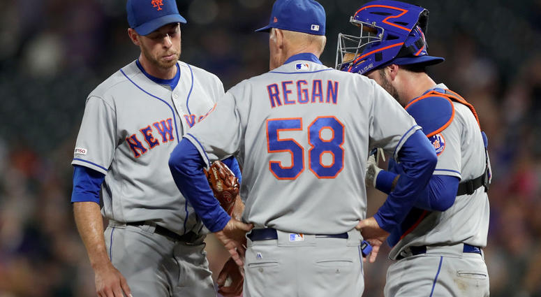 Starting pitcher Steven Matz #32 , pitching coach Phil Regan #58 and catcher Tomas Nido #3 of the New York Mets confer in the fourth inning against the Colorado Rockies at Coors Field on September 16, 2019 Starting pitcher Steven Matz #32 , pitching coach Phil Regan #58 and catcher Tomas Nido #3 of the New York Mets confer in the fourth inning against the Colorado Rockies at Coors Field on September 16, 2019