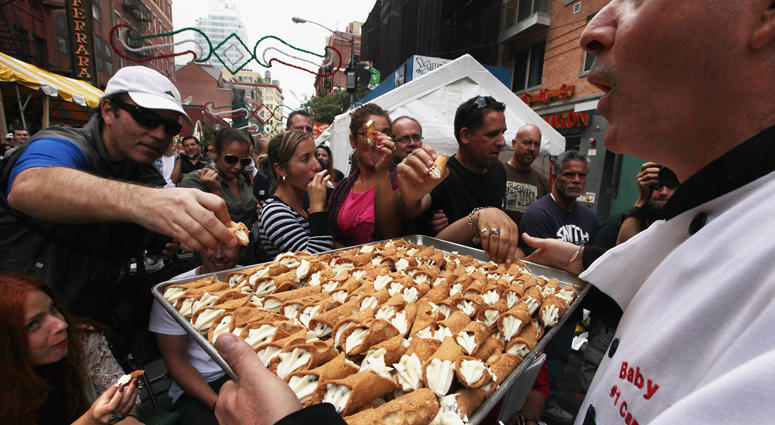 Free cannolis are passed out at the 85th annual Feast of San Gennaro festival September 15, 2011 in New York City. The annual Italian festival has taken place every September in Little Italy since 1926.