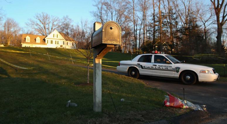 Police guard the entrance of the Lanza residence on December 19, 2012 in Newtown, Connecticut. Adam Lanza House