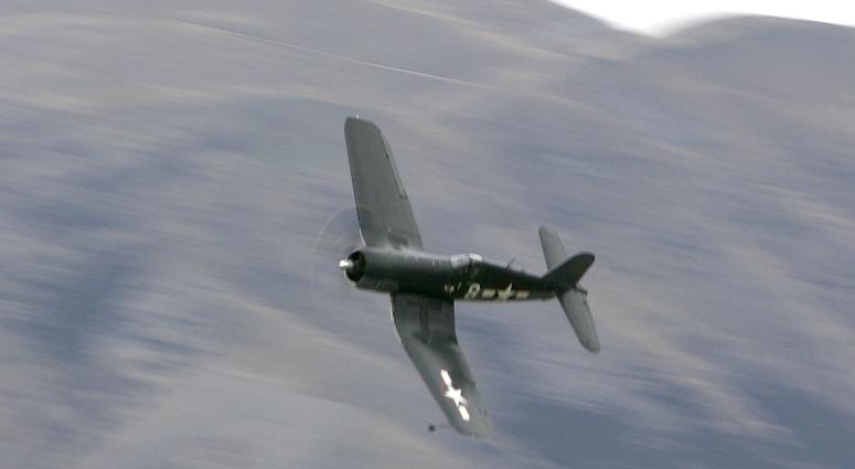 An F4U Corsair make a low pass over the airfield during the 'Warbirds over Wanaka' International Airshow on April 15, 2006 in Lake Wanaka, New Zealand. World War II plane F4U-4 Corsair