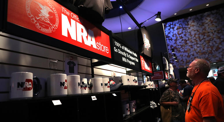 An attendee shops at the NRA store NRA