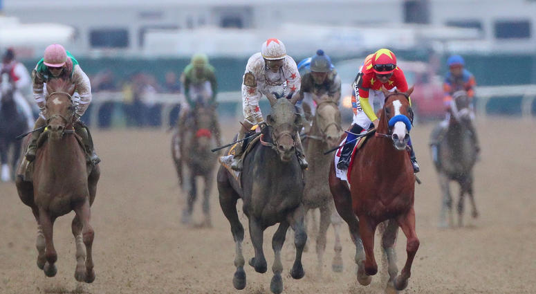 ELMONT, NY - JUNE 09: Justify #1, ridden by jockey Mike Smith crosses the finish line to win the 150th running of the Belmont Stakes at Belmont Park on June 9, 2018 in Elmont, New York. Justify becomes the thirteenth Triple Crown winner. ELMONT, NY - JUNE 09: Justify #1, ridden by jockey Mike Smith crosses the finish line to win the 150th running of the Belmont Stakes at Belmont Park on June 9, 2018 in Elmont, New York. Justify becomes the thirteenth Triple Crown winner.