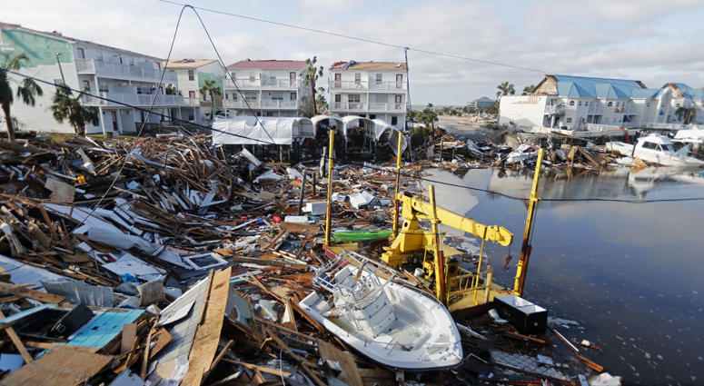 A boat sits amidst debris in the aftermath of Hurricane Michael in Mexico Beach, Fla., Thursday, Oct. 11, 2018. Hurricane Michael