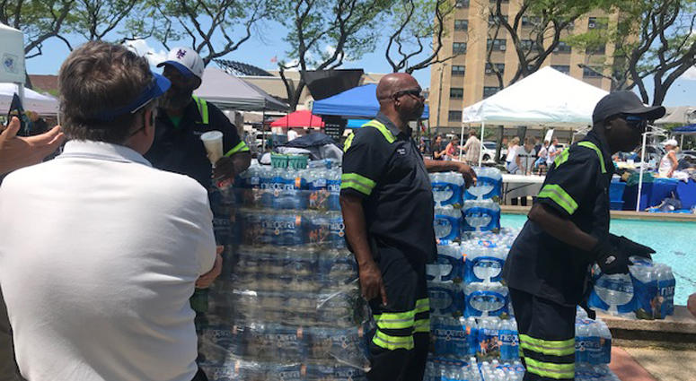 Water bottles handed out to Long Beach residents after E. coli detected in city water. Long Beach E. coli