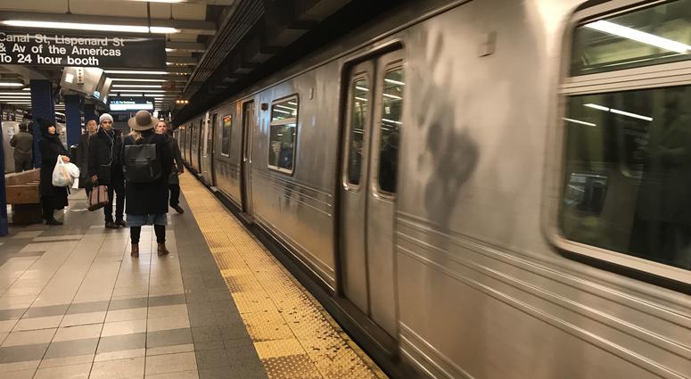 An A train pulls into the Canal Street station in Manhattan. Subway Train Canal Street