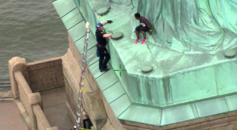 A woman climbed the STatue of Liberty on July 4 leading to the evacuation of the island. Statue Of Liberty Climber