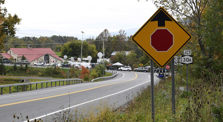 Television networks broadcast at the roadside memorial scene of Saturday's fatal limousine crash in Schoharie, N.Y., Monday, Oct. 8, 2018. Limo Crash Site