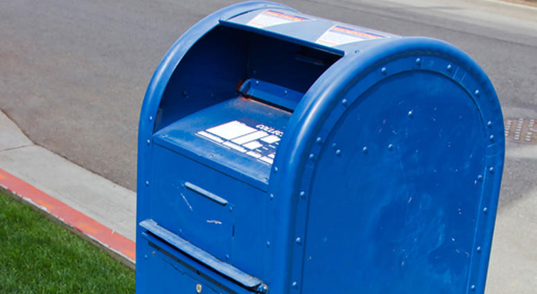 Drop box for mail on the corner of a street. Drop box for mail on the corner of a street.
