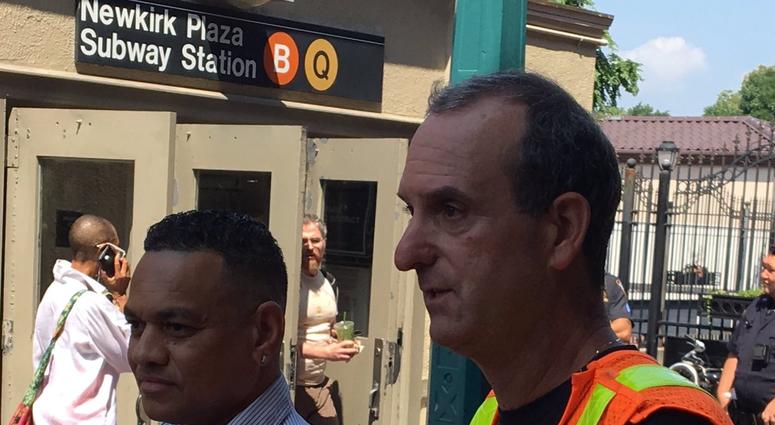 Two MTA employees save a woman Two MTA employees save a woman