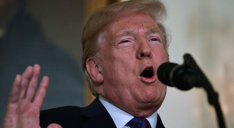 President Donald Trump speaks in the Diplomatic Reception Room of the White House on Friday, April 13, 2018, in Washington, about the United States' military response to Syria's chemical weapon attack on April 7. President Donald Trump speaks in the Diplomatic Reception Room of the White House on Friday, April 13, 2018, in Washington, about the United States' military response to Syria's chemical weapon attack on April 7.
