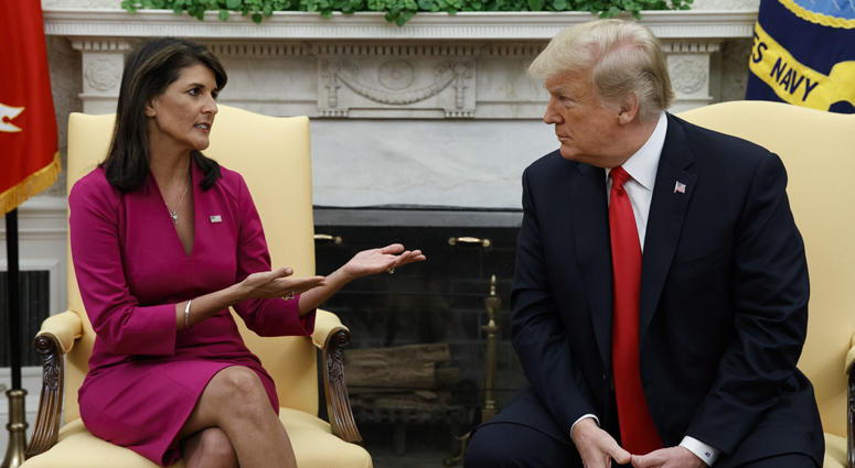 President Donald Trump meets with outgoing U.S. Ambassador to the United Nations Nikki Haley in the Oval Office of the White House, Tuesday, Oct. 9, 2018, in Washington. President Donald Trump, Nikki Haley