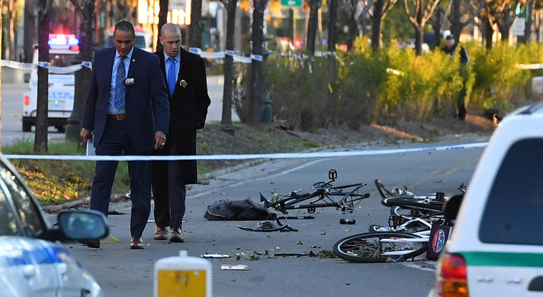 Police secure the scene at a bike path at Houston Street and West Street in lower Manhattan Bike Path Attack