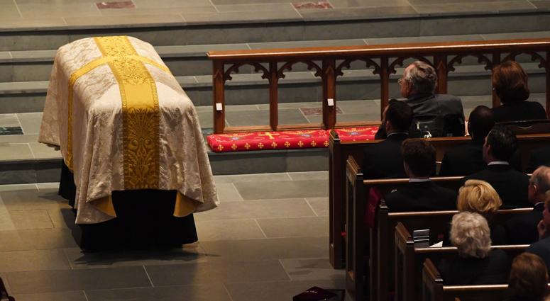 The casket is placed next to former President George H.W. Bush during the funeral for former First Lady Barbara Bush at St. Martin s Episcopal Church. George H.W. Bush