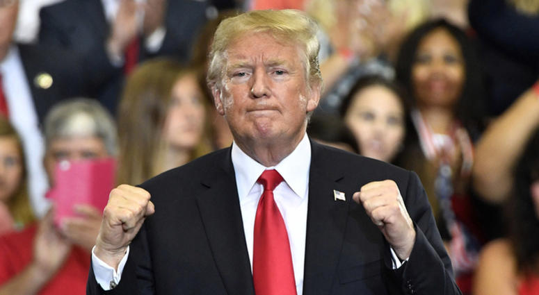 President Donald Trump gestures during his rally at Municipal Auditorium. trump