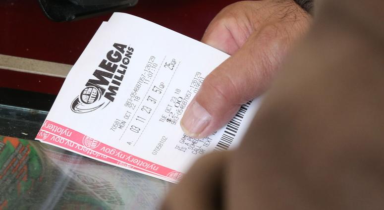 Manny Pabon of Poughkeepsie purchases his Mega Million lotto ticket at the Vassar Road Stewart's in the Town of Poughkeepsie on October 22, 2018. Mega Millions Tickets