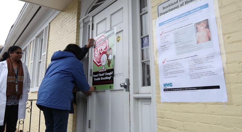 Rockland County Department of Health workers display posters during a measles (MMR) vaccination clinic at WIC Office in Haverstraw on Friday, April 5, 2019. Measles Rockland County