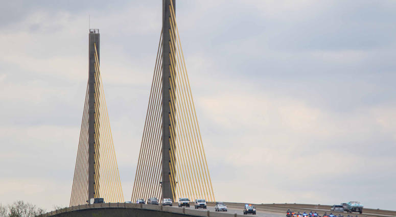 A motorcade carries the body of Marine Staff Sgt. Christopher Slutman, who was killed in a roadside bomb in Afghanistan, from the Dover Air Force Base to New York City on Monday morning. Firefighters Honor Fallen Marine