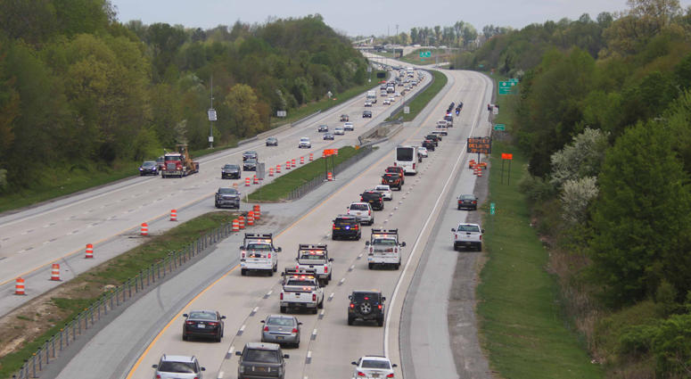 A motorcade carries the body of Marine Staff Sgt. Christopher Slutman, who was killed in a roadside bomb in Afghanistan, from the Dover Air Force Base to New York City on Monday morning. Firefighters Honor Fallen Marine