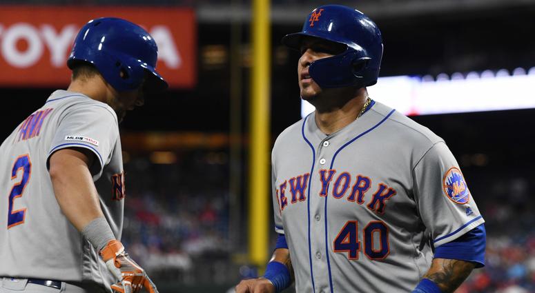 ew York Mets catcher Wilson Ramos (40) is congratulated by second baseman Joe Panik (2) after scoring a run in the ninth inning against the Philadelphia Phillies at Citizens Bank Park. Mets Phillies