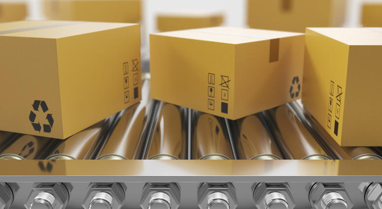 Recycled packaging on conveyor belt