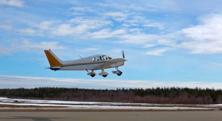 Small Plane Taking Off at a Local Airport Small plane