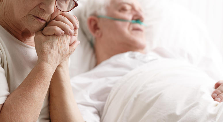 Elderly couple in a hospital room. Elderly couple in a hospital room.
