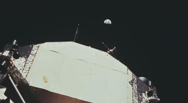 Earth from the Moon The Lunar Module or 'Eagle' on the Moon with the Earth visible behind it.