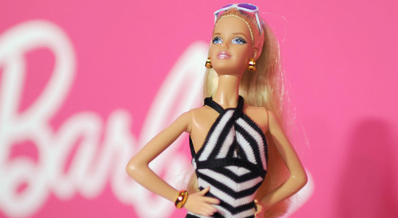 Barbie Doll wearing wearing vintage 1959 black and white bathing suit . Barbie