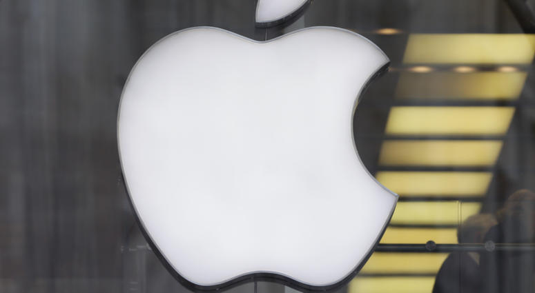 File photo dated 28/01/15 of the Apple logo in the window of a store. Apple Logo