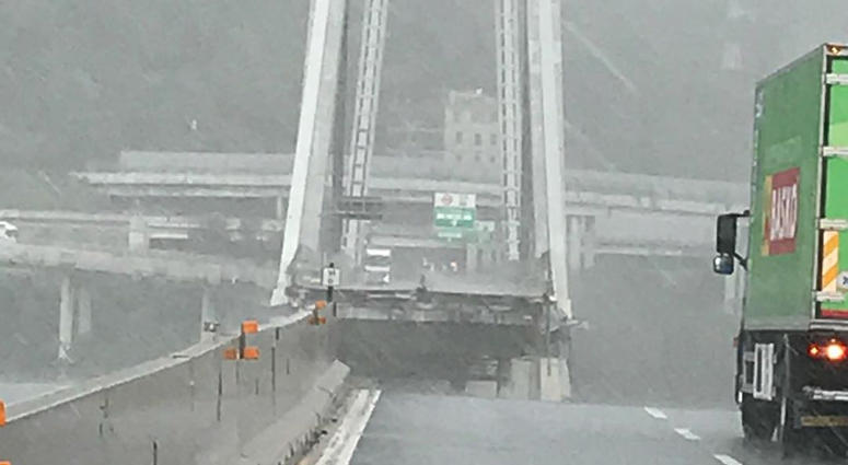 Photo taken on Aug. 14, 2018 shows a partially collapsed bridge in Genoa, Italy. Italy Bridge Collapse