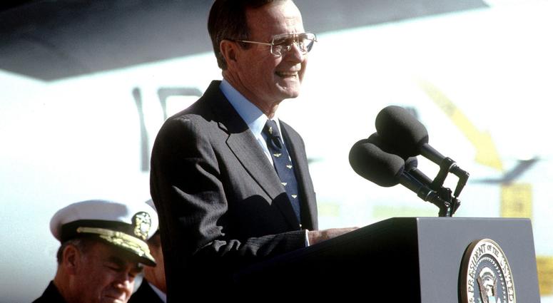 President George H.W. Bush delivers an address aboard the aircraft carrier USS America. George H.W. Bush