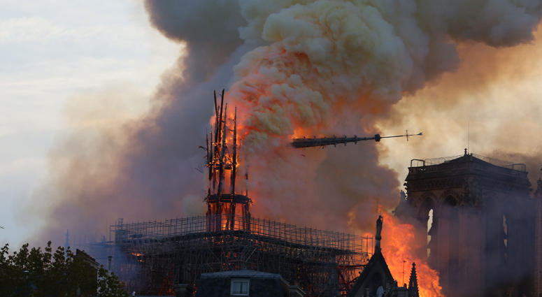 Flames rise from Notre Dame cathedral as it burns in Paris, Monday, April 15, Notre Dame on Fire