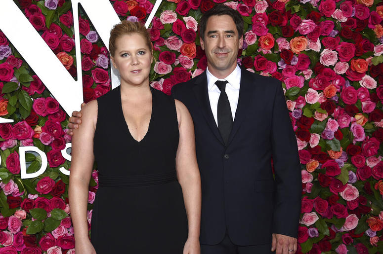 Amy Schumer and Chris Fischer