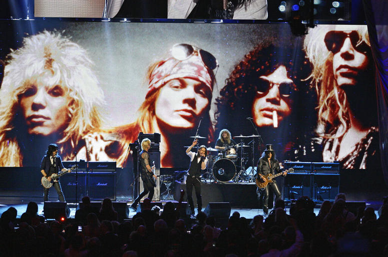 Guns N' Roses performs with singer Myles Kennedy after their induction into the Rock and Roll Hall of Fame in Cleveland